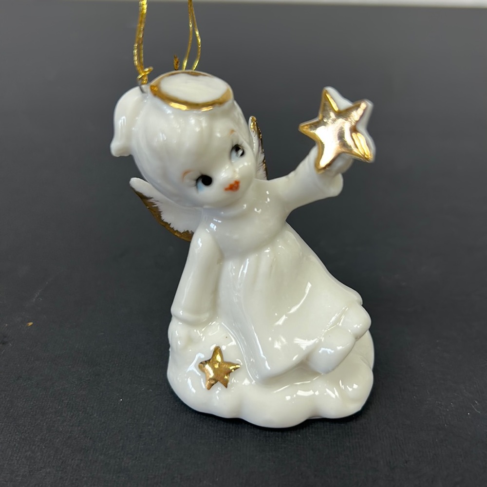 Vintage porcelain angel with star ornament made in Taiwan